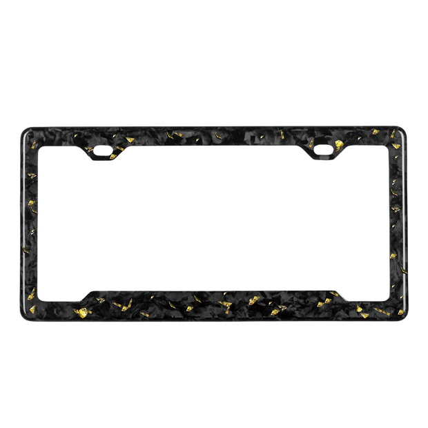 Pristine Carbon forged carbon license plate frame — gold fragment close-up, glossy finish